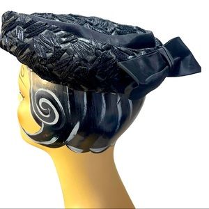 Beautiful black vintage hat with bow. Antique 60s